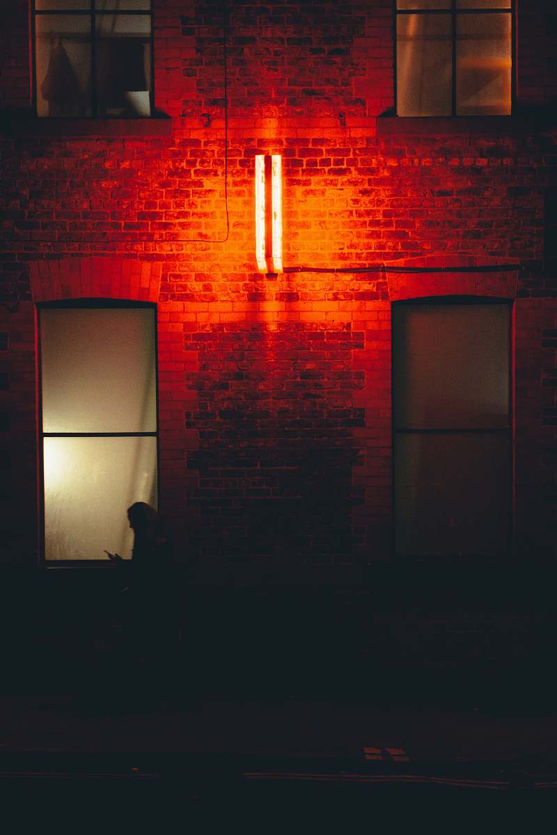 cross silhouette of woman symbol