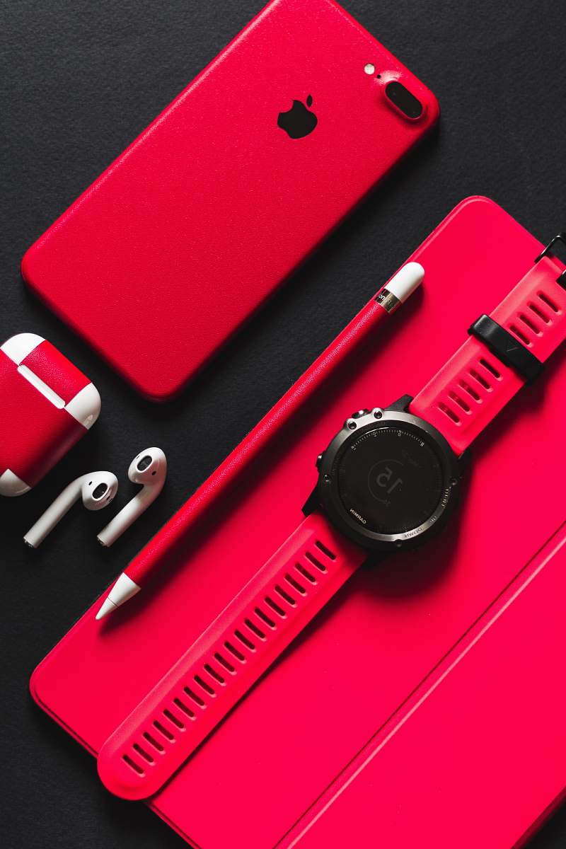 watch smartwatch, stylus, AirPods, and product red iPhone 7 on black surface pencil
