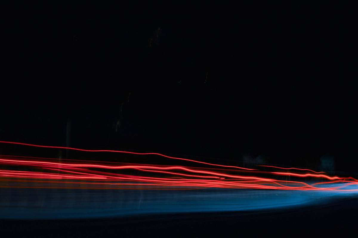 light time lapse photo of red lights line