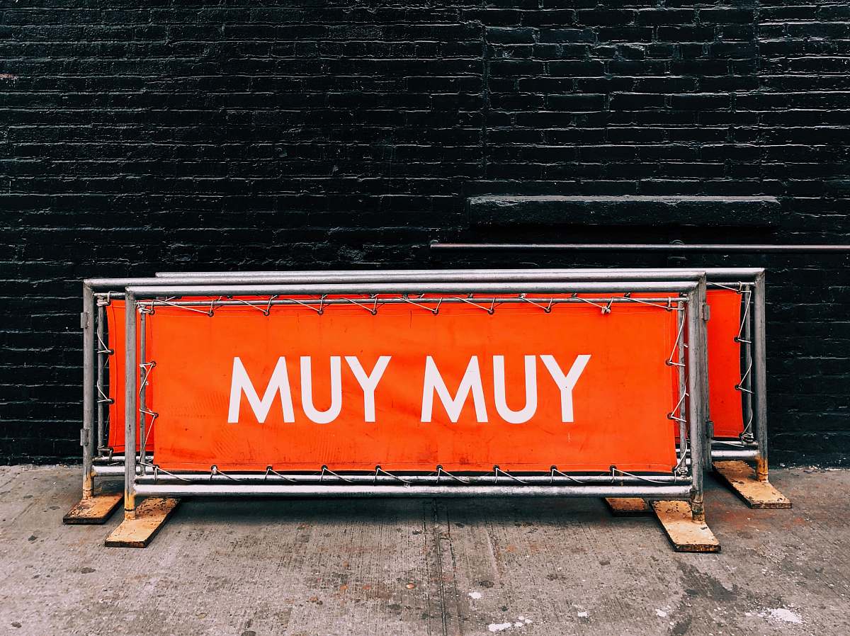 sign Yum Yum printed railing near wall decorative