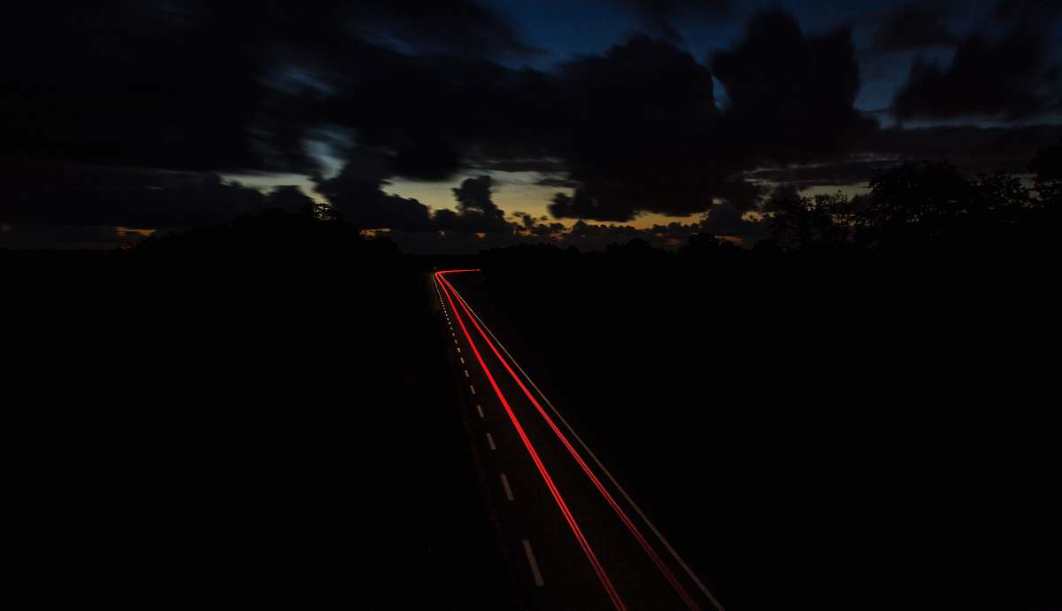 car time lapse photography of vehicle light evening