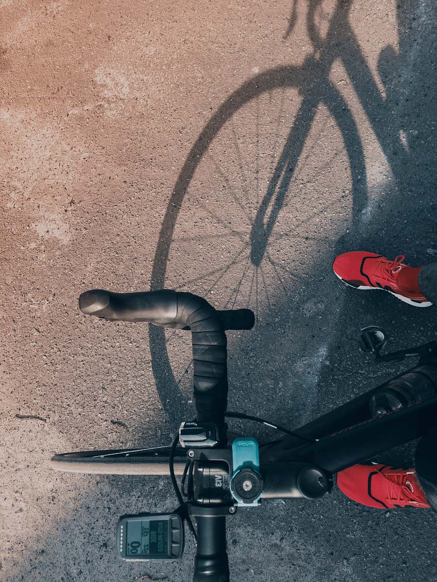 clothing person rides road bike footwear
