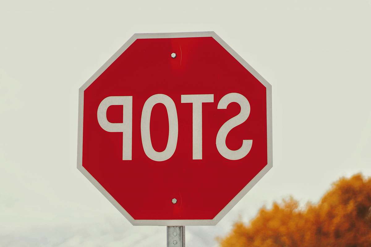 symbol selective-photography of stop signage road sign