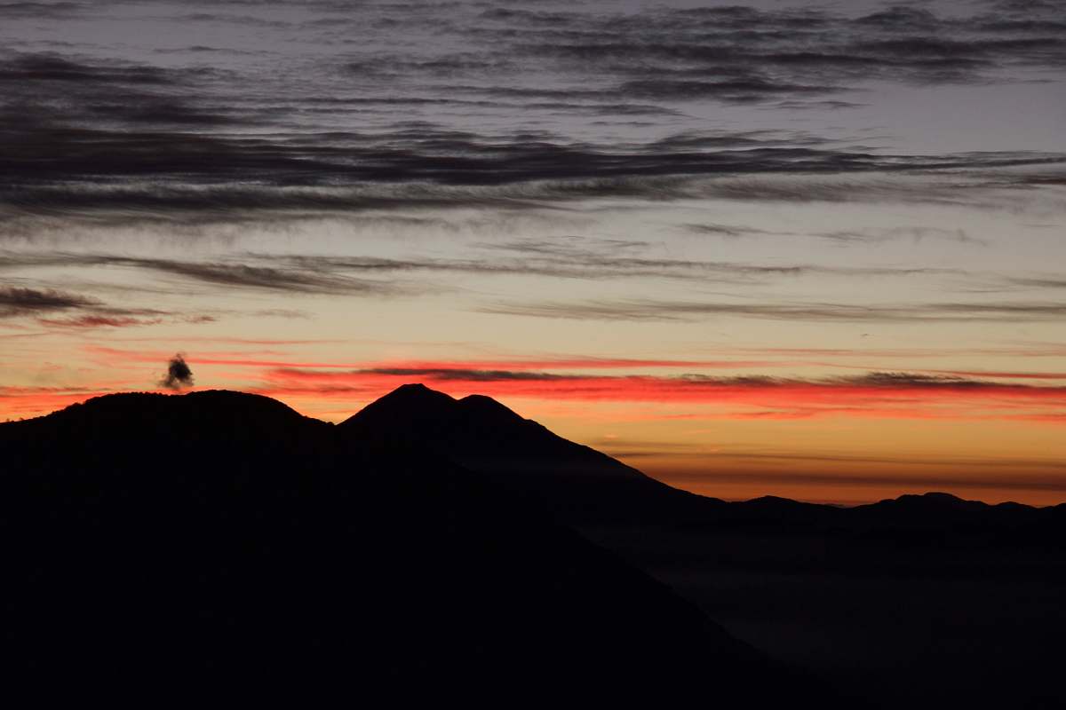 sunrise silhouette of mountain against sunlight guatemala
