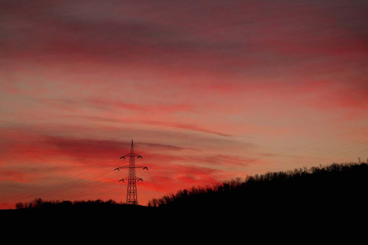sunset silhouette of transmitter site dusk