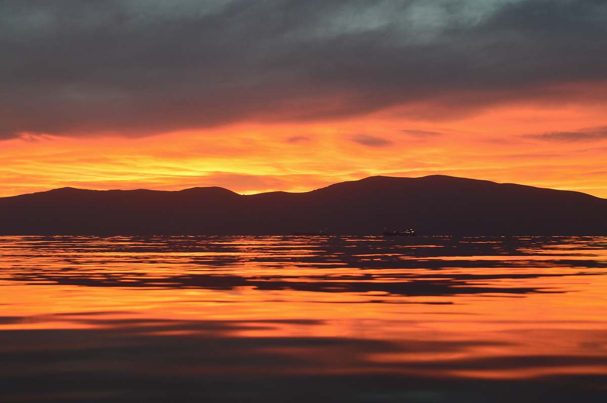 sunset silhouette of mountains during sunset albania