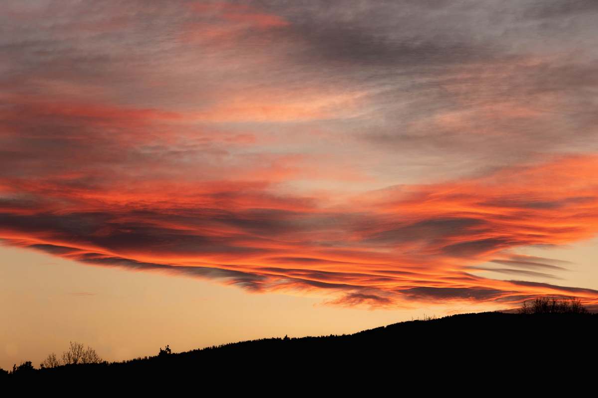 nature silhouette of mountain under golden hour outdoors