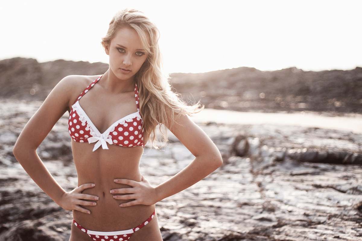 apparel selective focus photo of woman wearing white-and-red bikini clothing