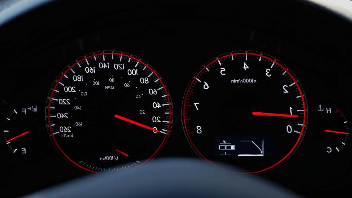 gauge vehicle instrumental panel cluster displaying 0.8 black