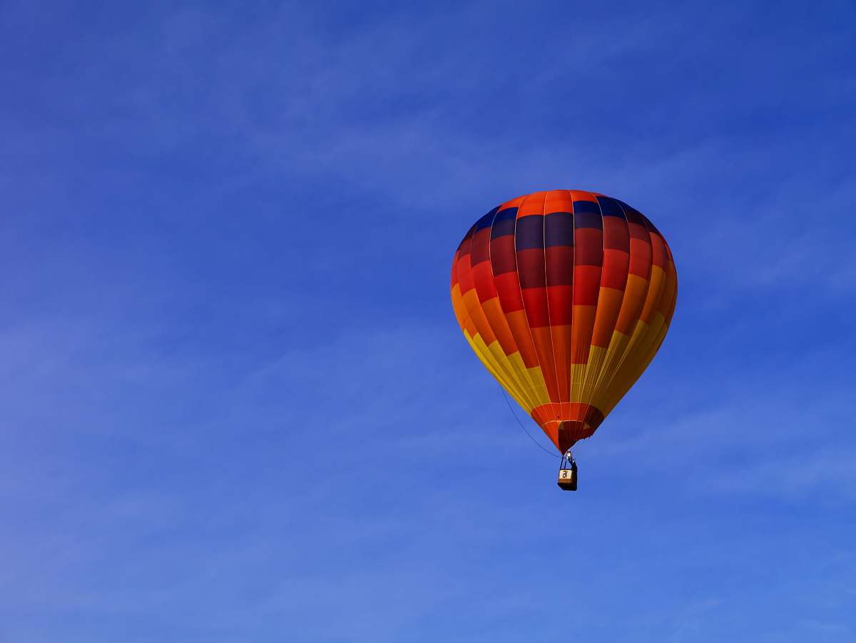 balloon photo of red hot air balloon on sky hot air balloon