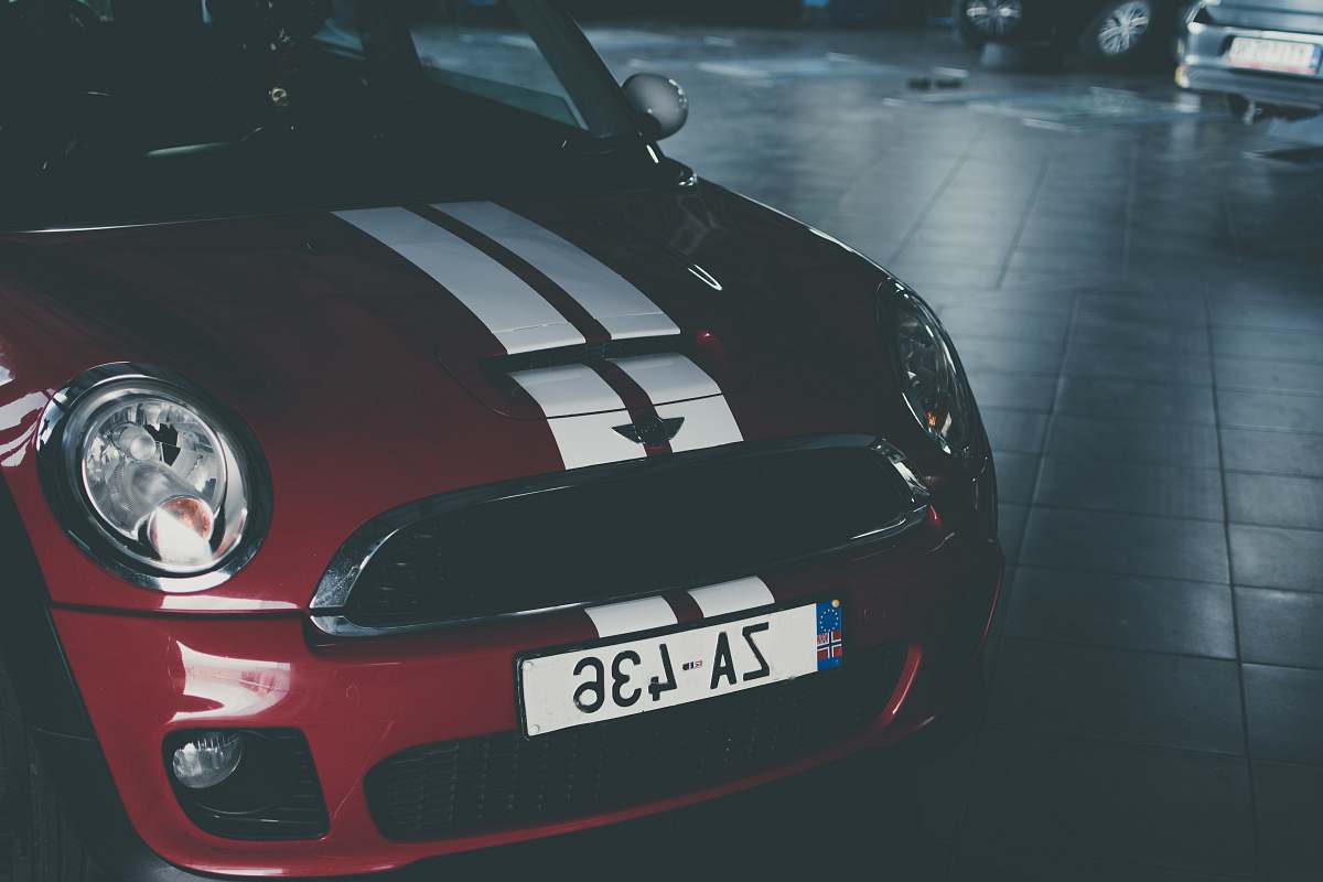 car red and white Mini Cooper automobile