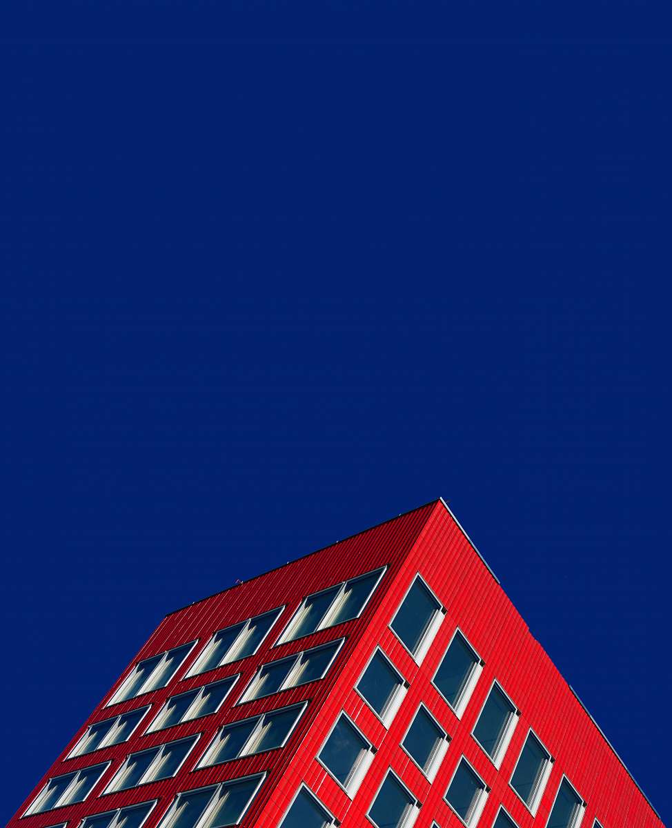building worm's eyeview of red building zürich