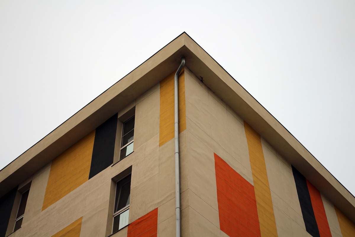 mongolia beige and red concrete building facade building