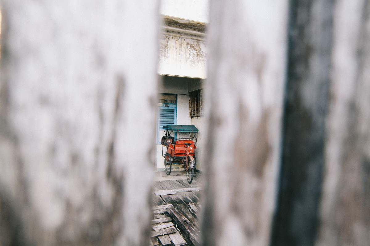 indonesia photo of red rickshaw wagon