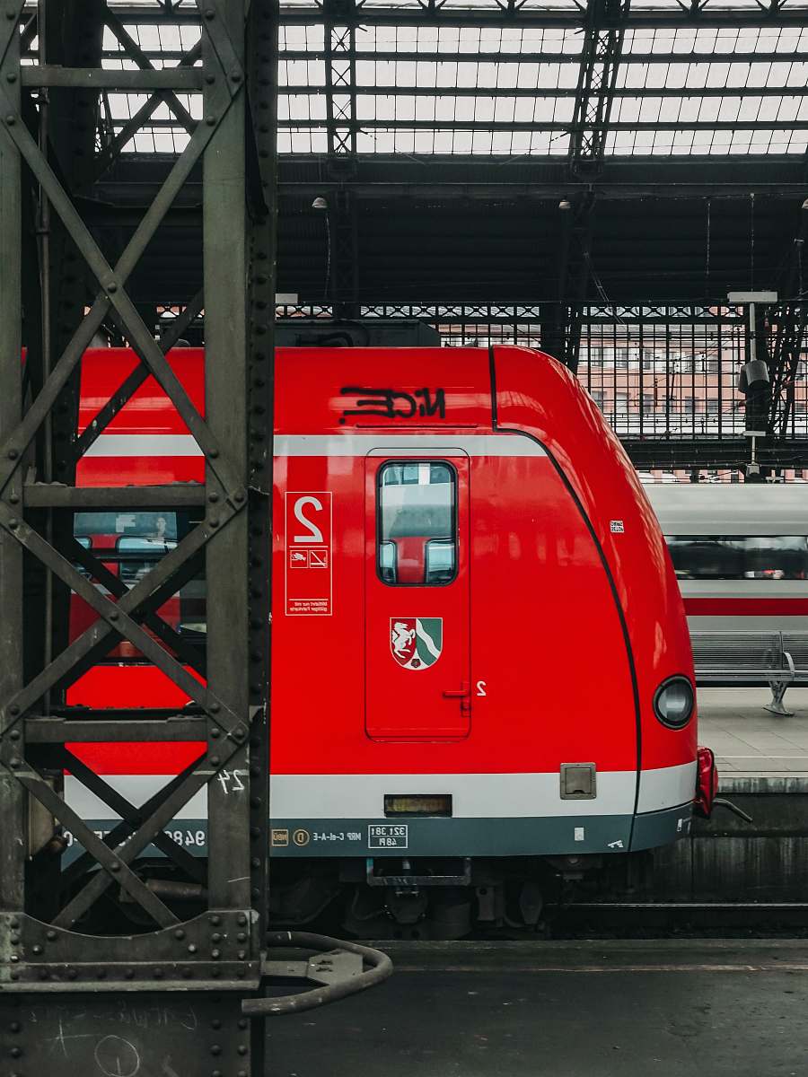 train red and white train in station transportation