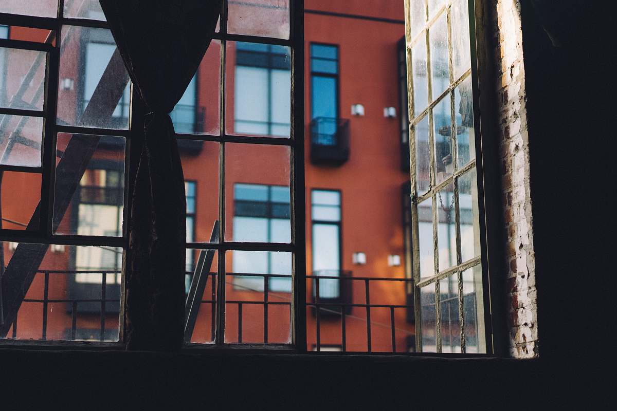 building minimalist photo of glass window with building view red