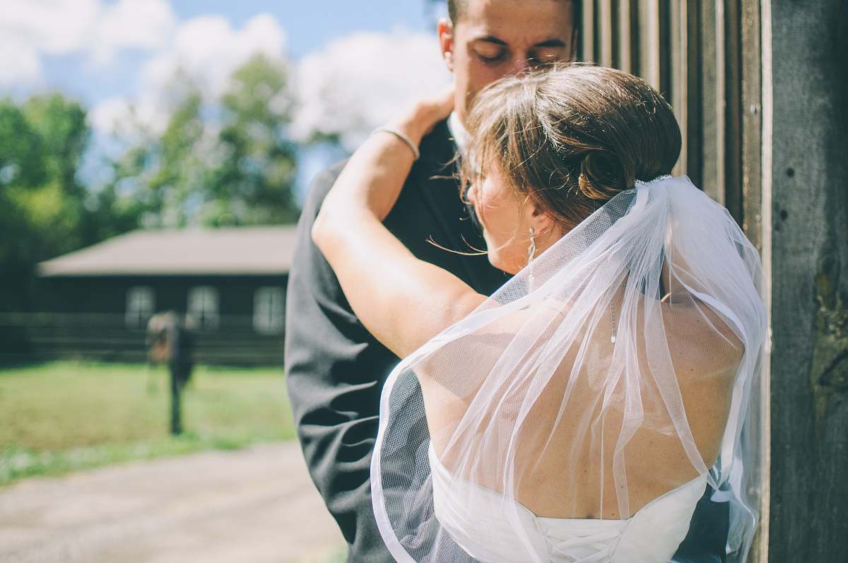 people woman hugging man during daytime person