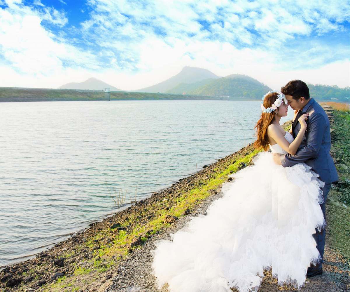 person bride and groom looking at each other human