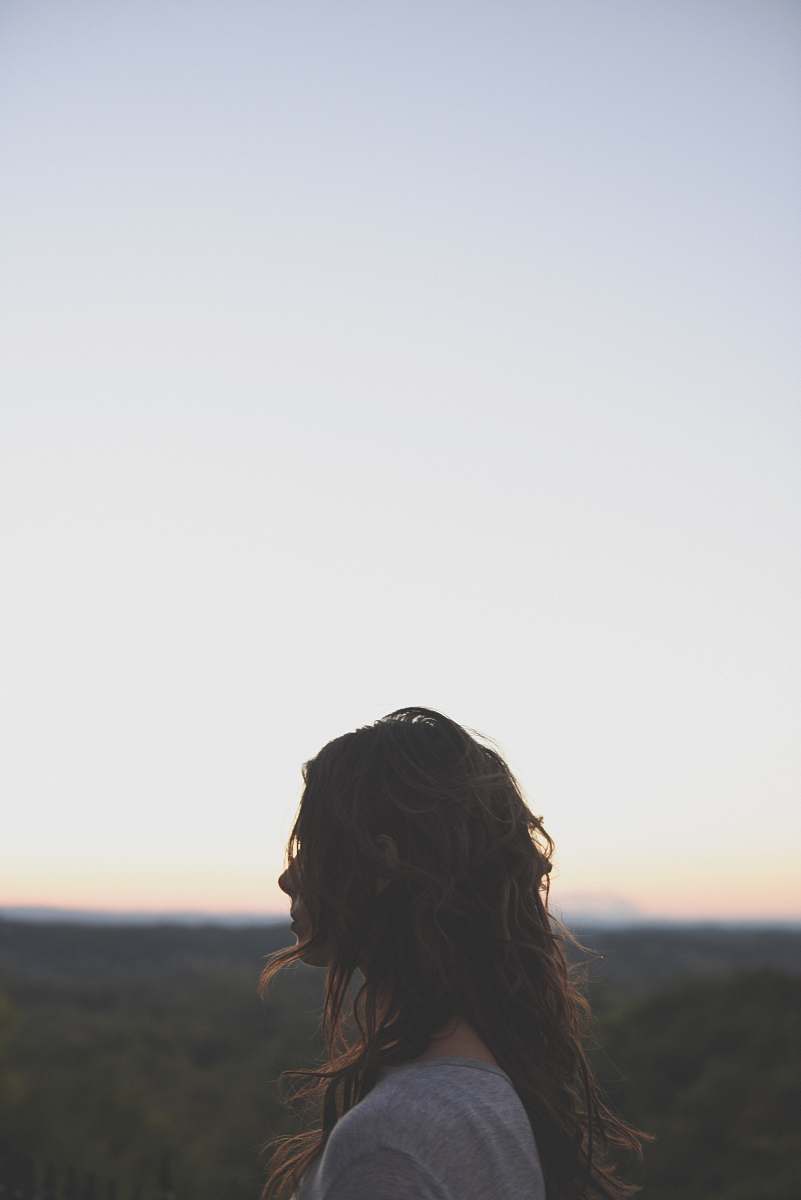 human brunette hair woman wearing gray top looking side way woman