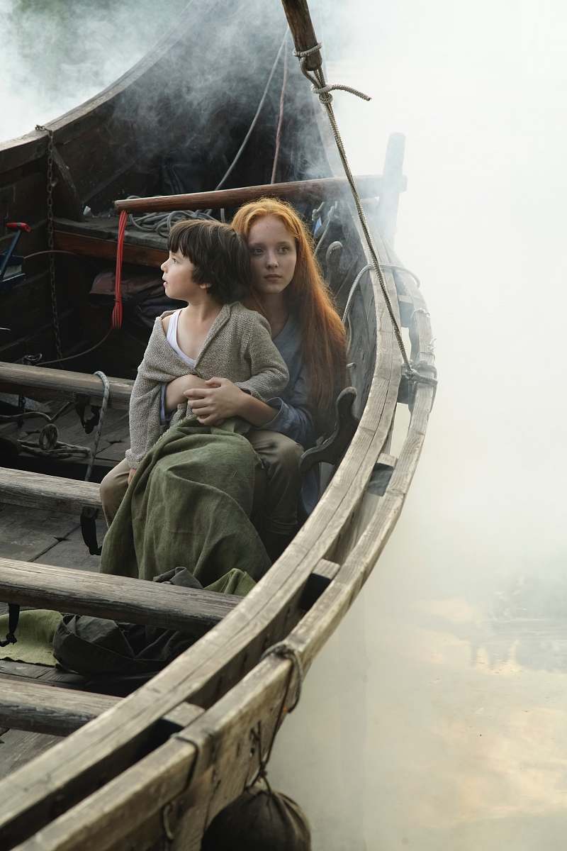 person girl and boy riding brown canoe boat human