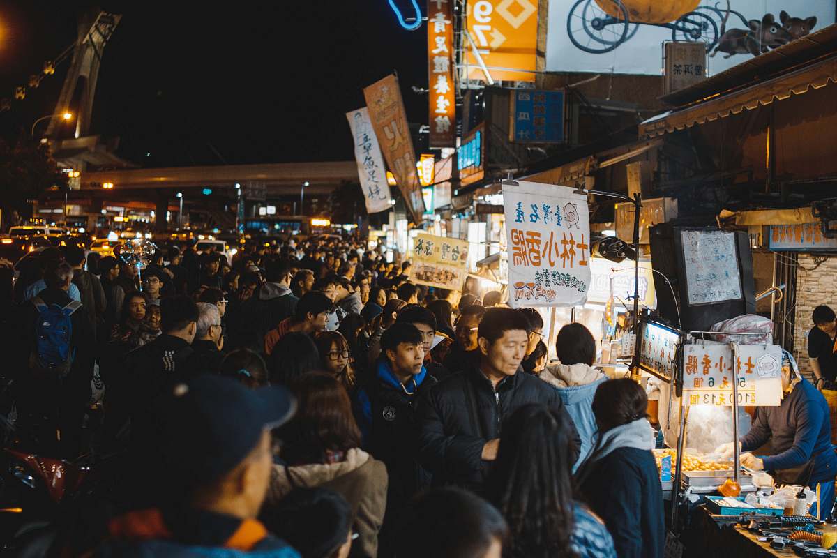 person group of people infront of store human