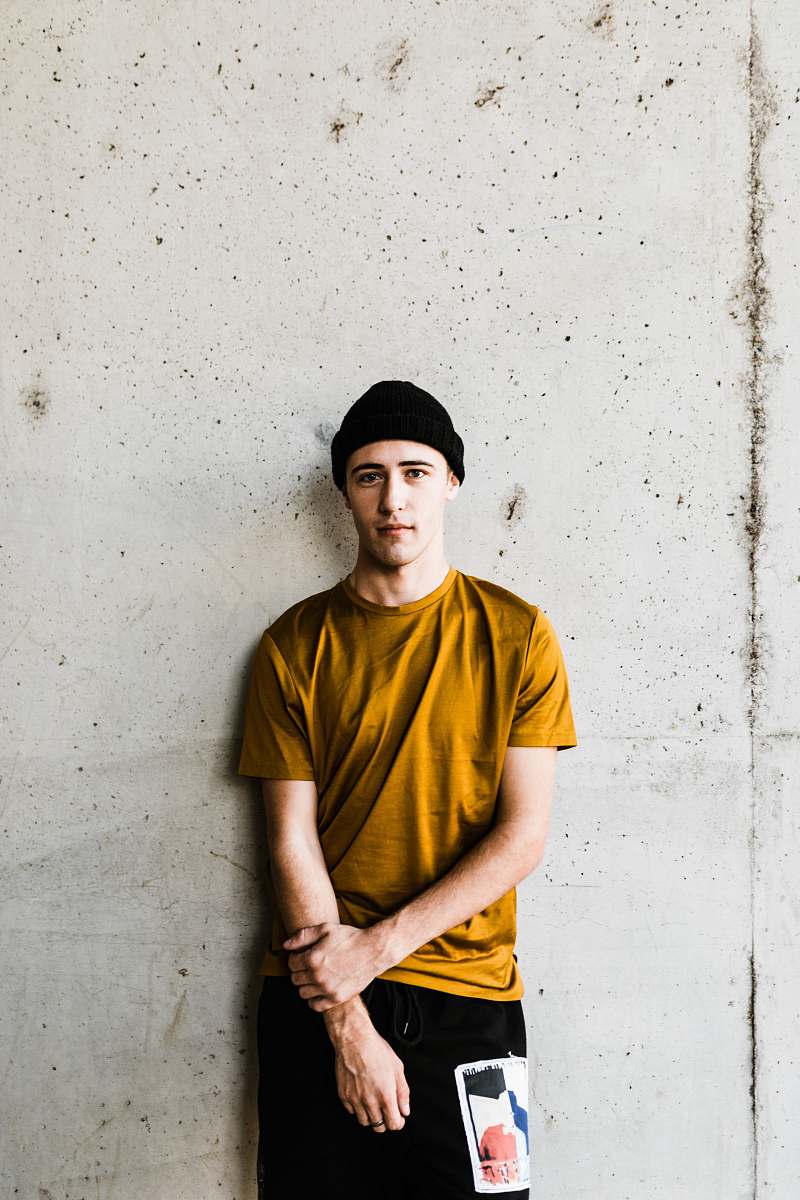 person man standing while holding his hand human