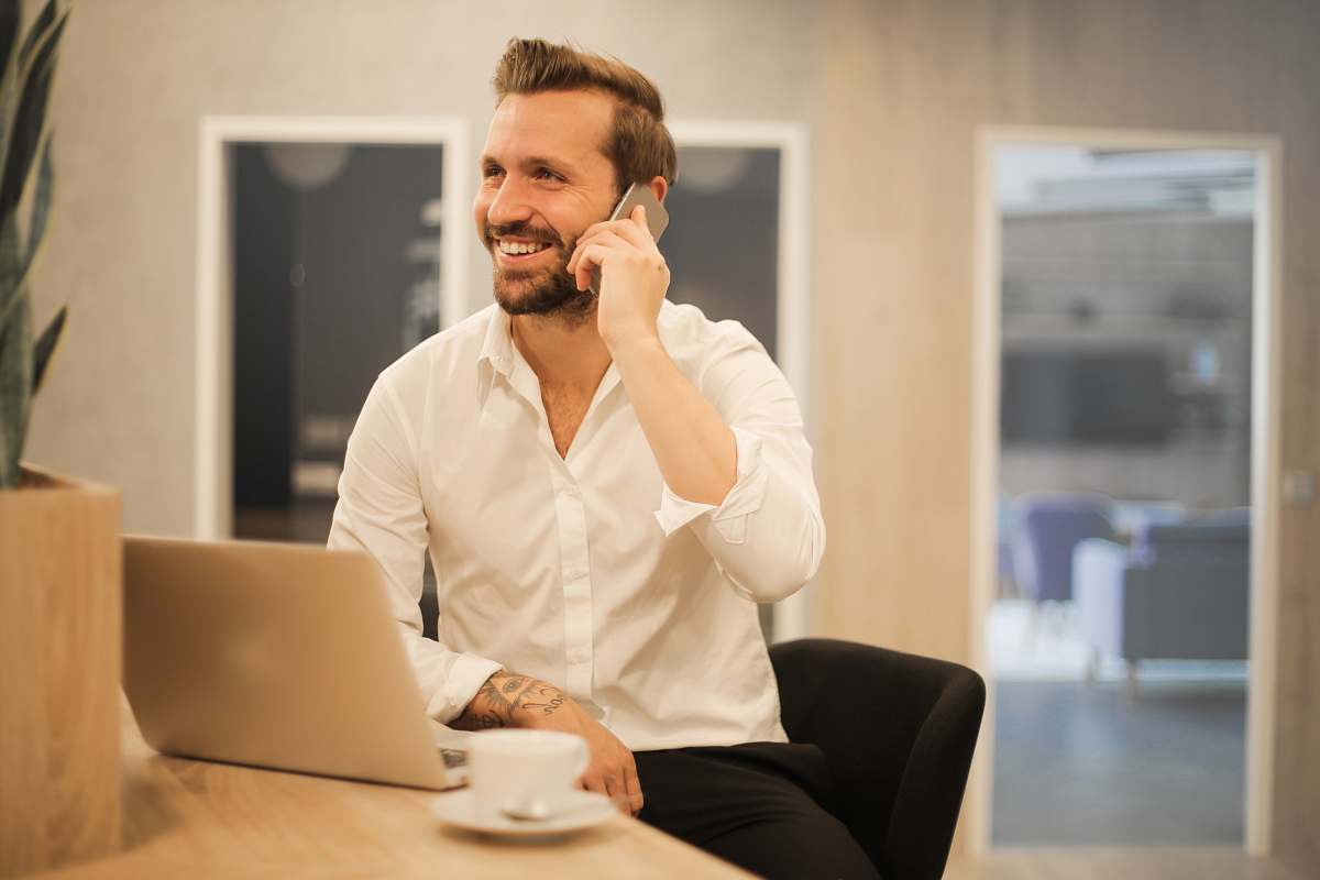 human man using smartphone on chair person
