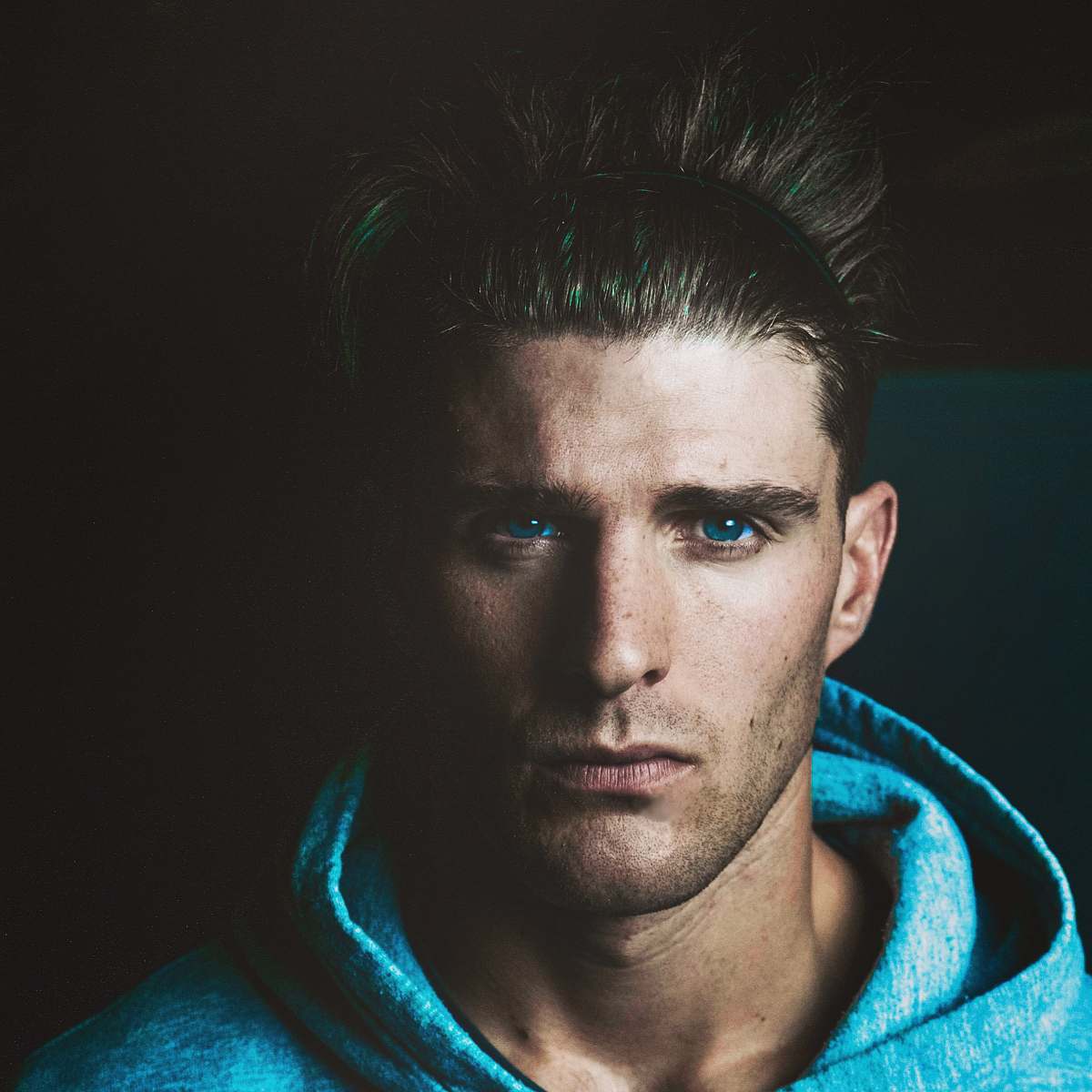 human man wearing blue hoodie person