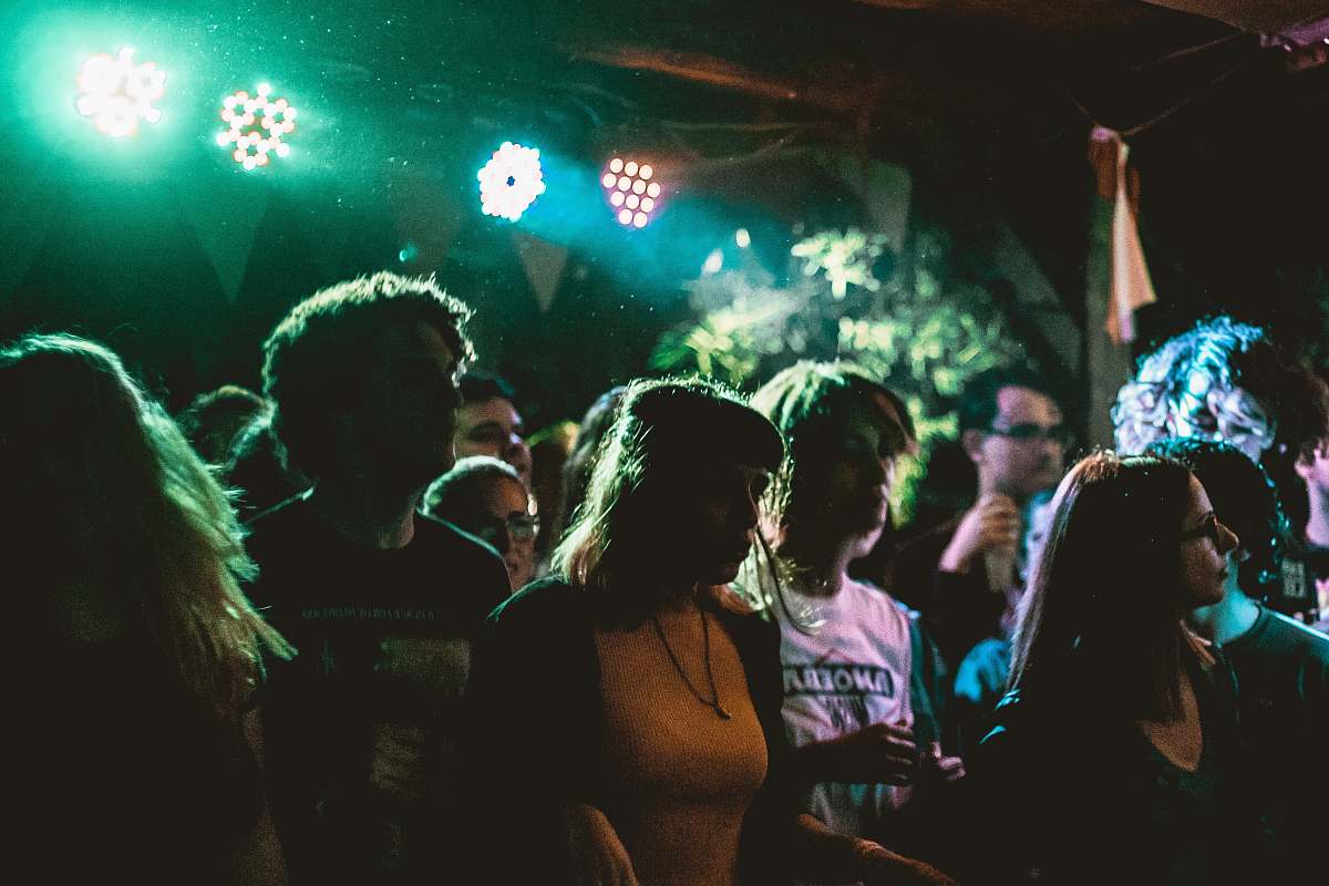 person people inside the club with disco lights human