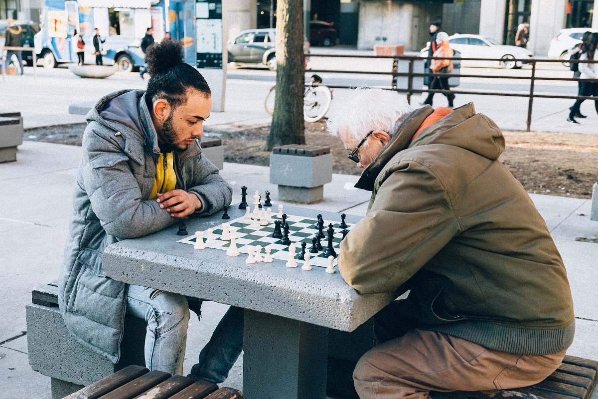 chess people playing chessboard game outdoor game Image - Free Stock Photo