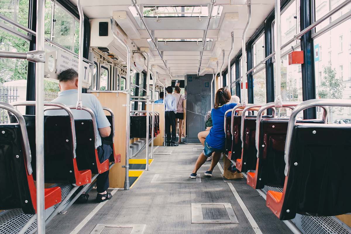vehicle people riding the bus at daytime transportation