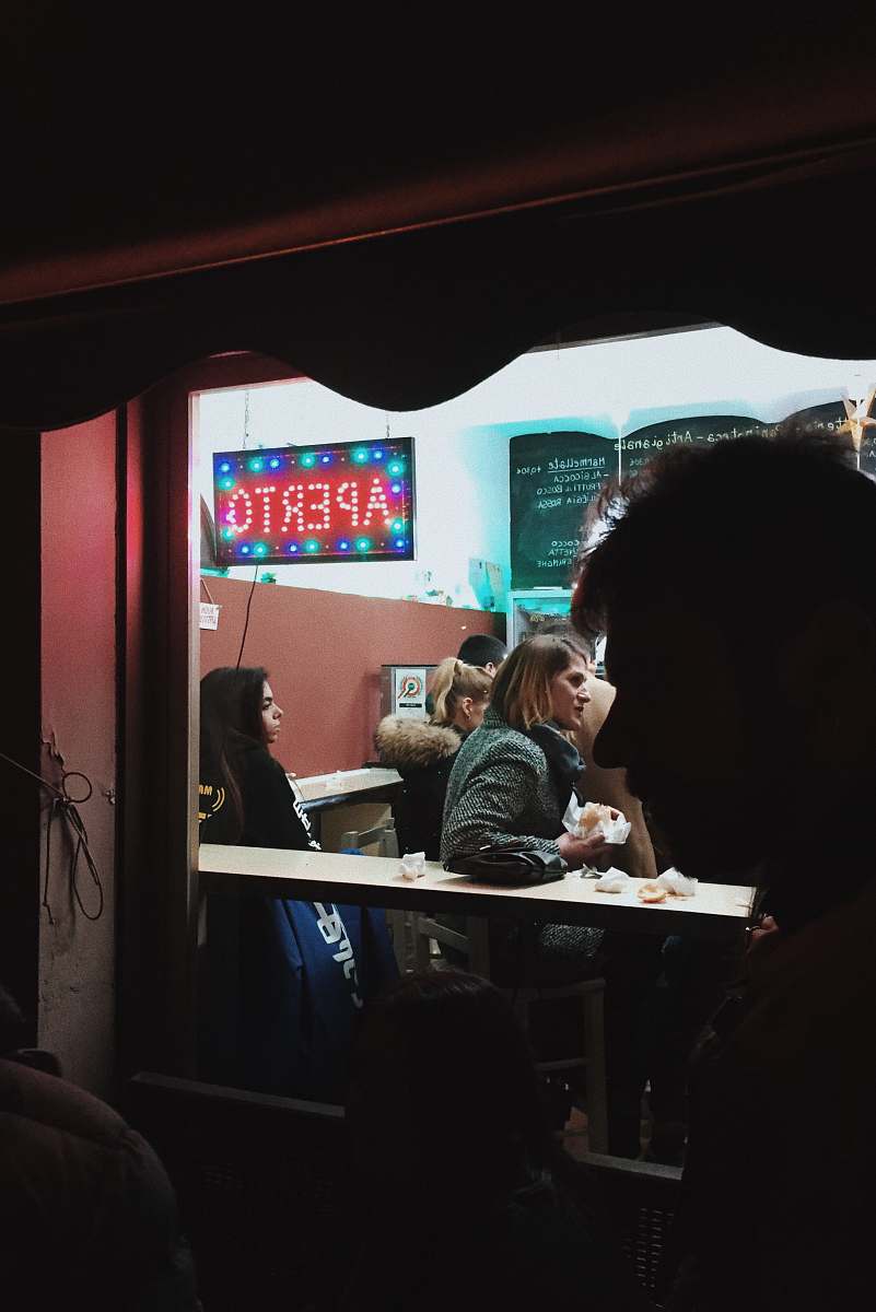 person people sitting on chair beside table inside room human