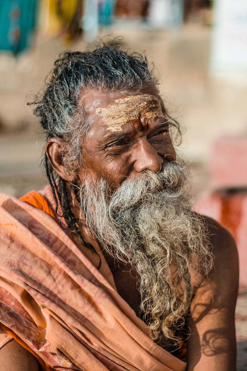 person selective focus photograph of man in orange outfit human