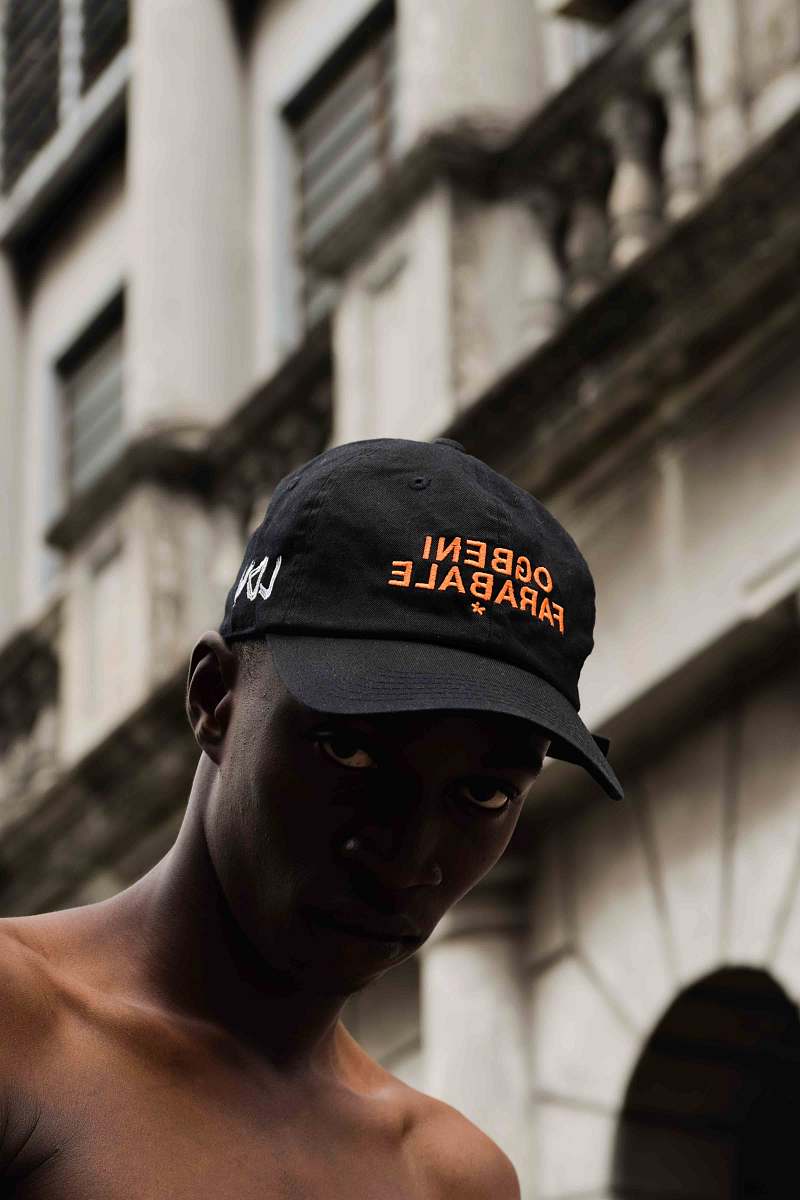 cap selective focus photography of man wearing cap hat