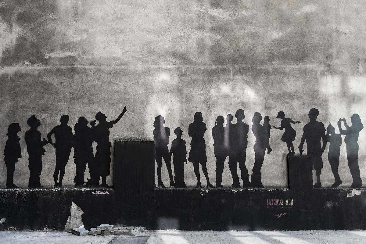 human silhouette of people wall art photo person