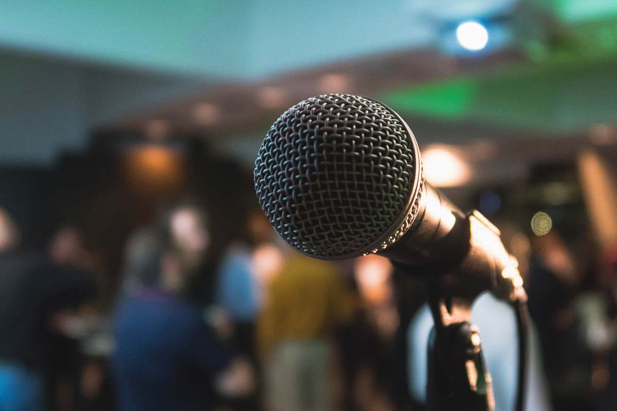 human silver corded microphone in shallow focus photography microphone