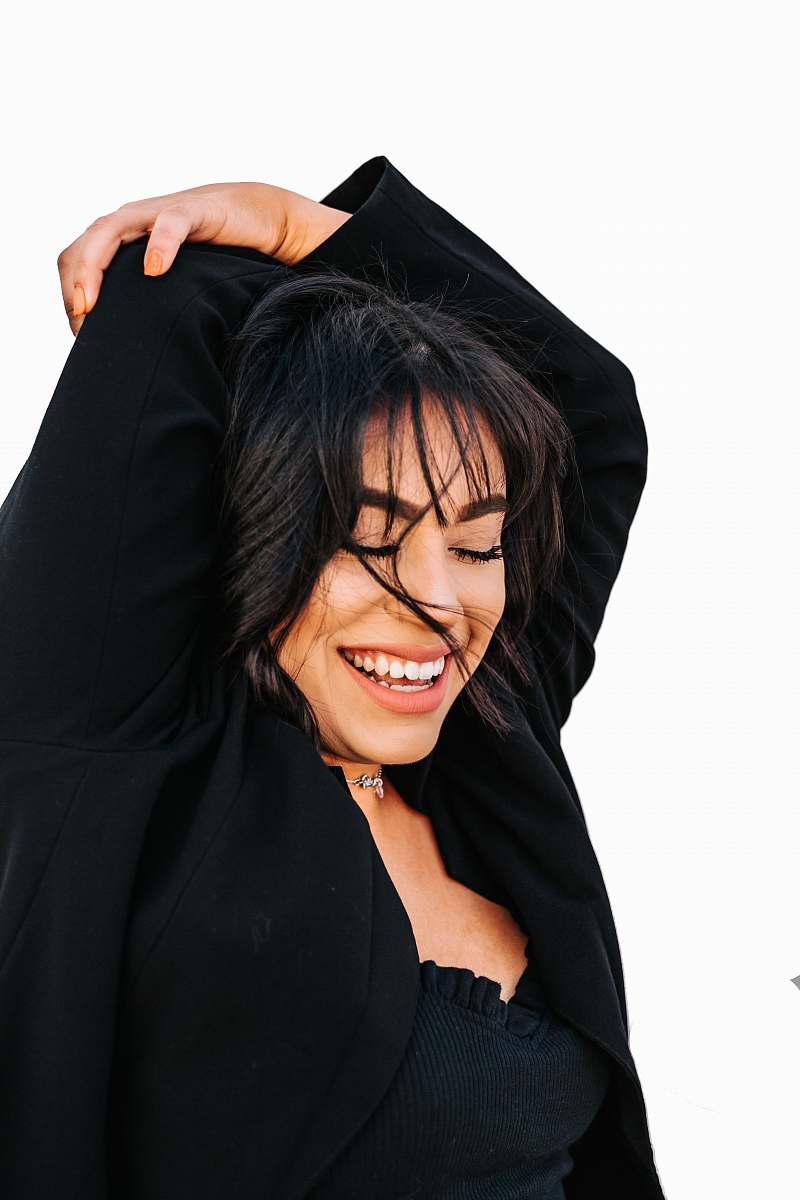 person smiling woman stretching her arms human