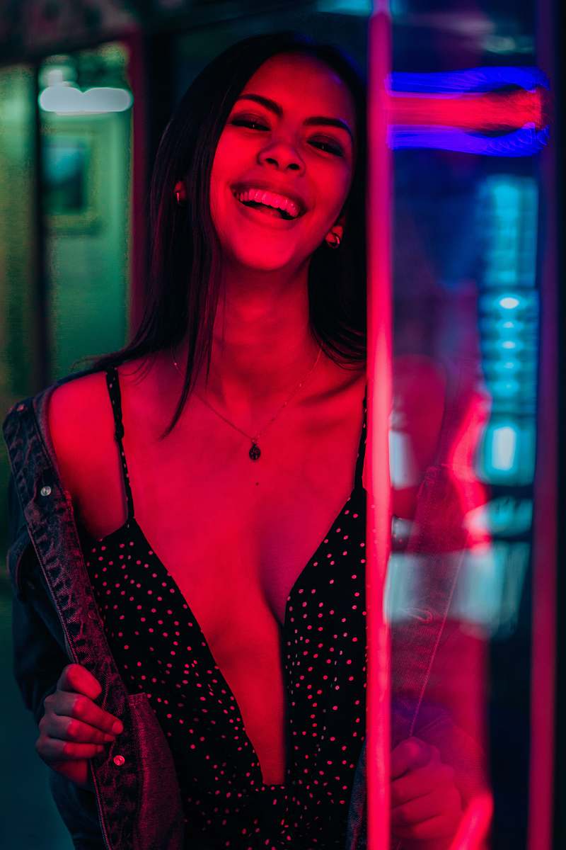 human smiling woman wearing black polka-dot top person