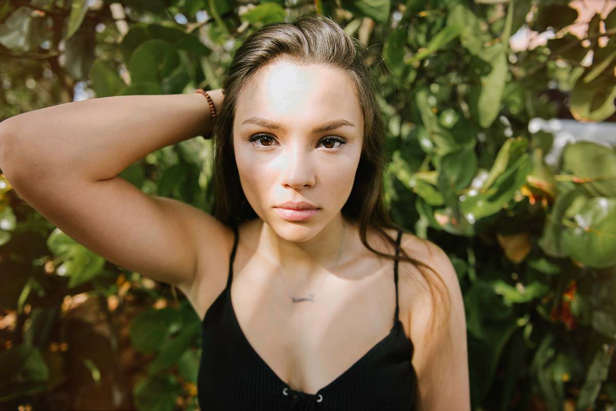 human woman holding her hair person