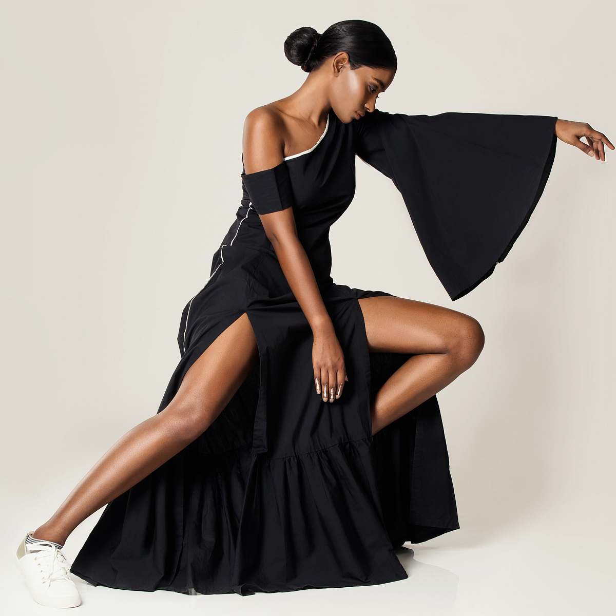 human woman in black one shoulder dress posing person