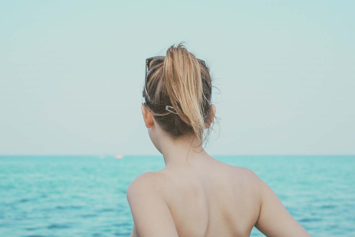 person woman looking at sea at daytime human