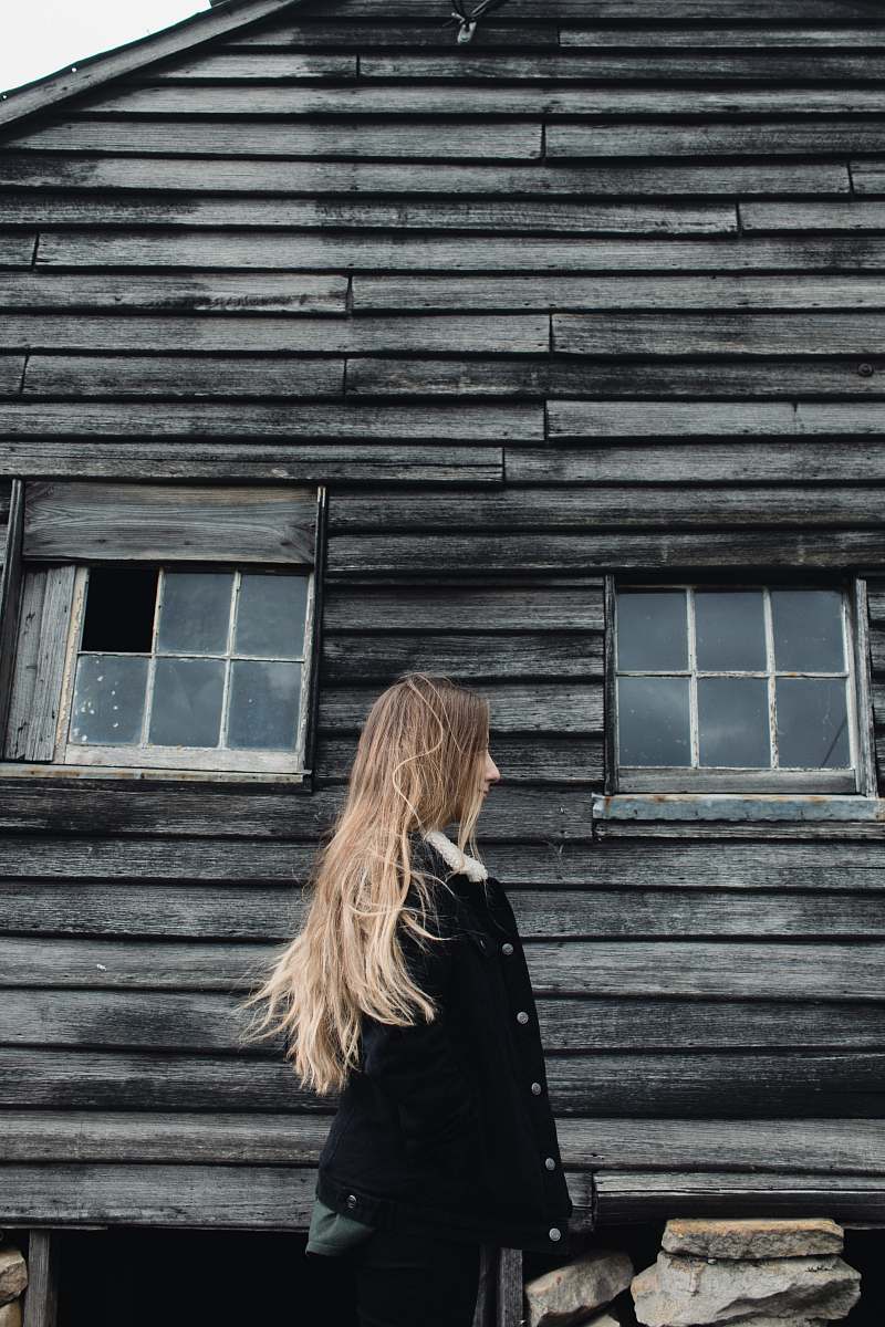 person woman standing near cabin girl