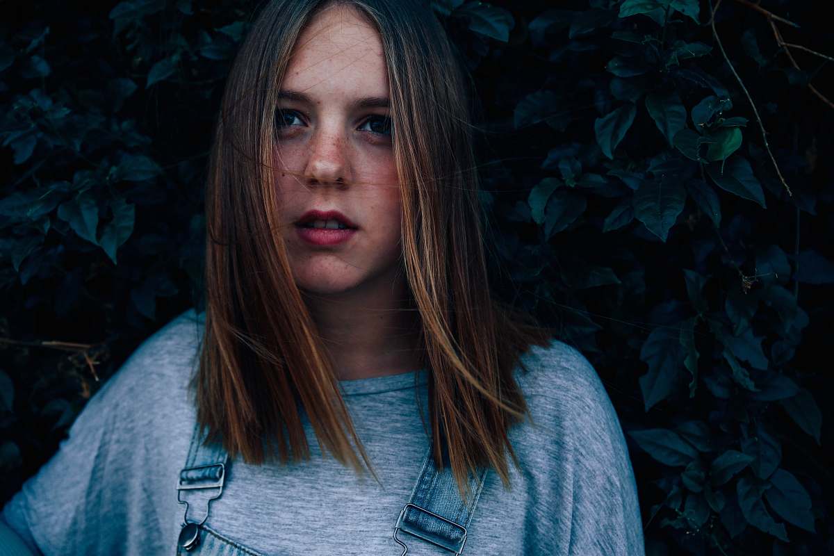 human woman wearing gray crew-neck t-shirt person