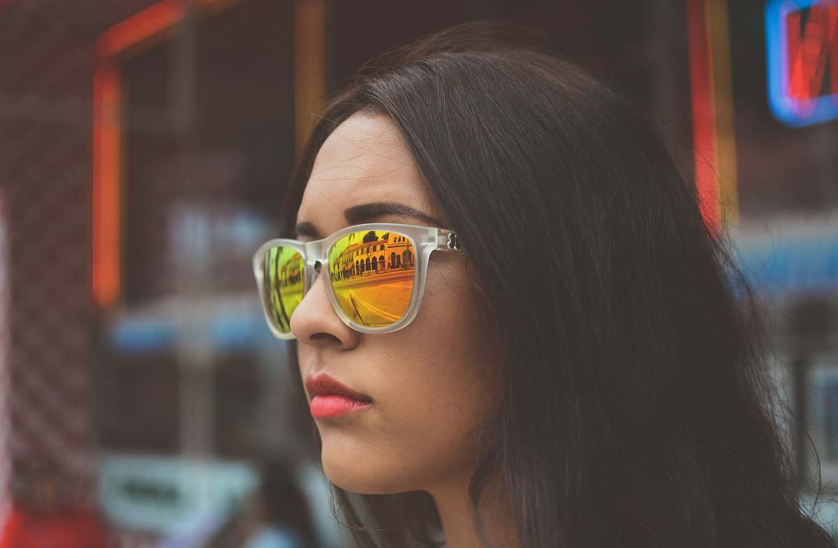 person woman wearing neo-chrome sunglasses with gray frames human
