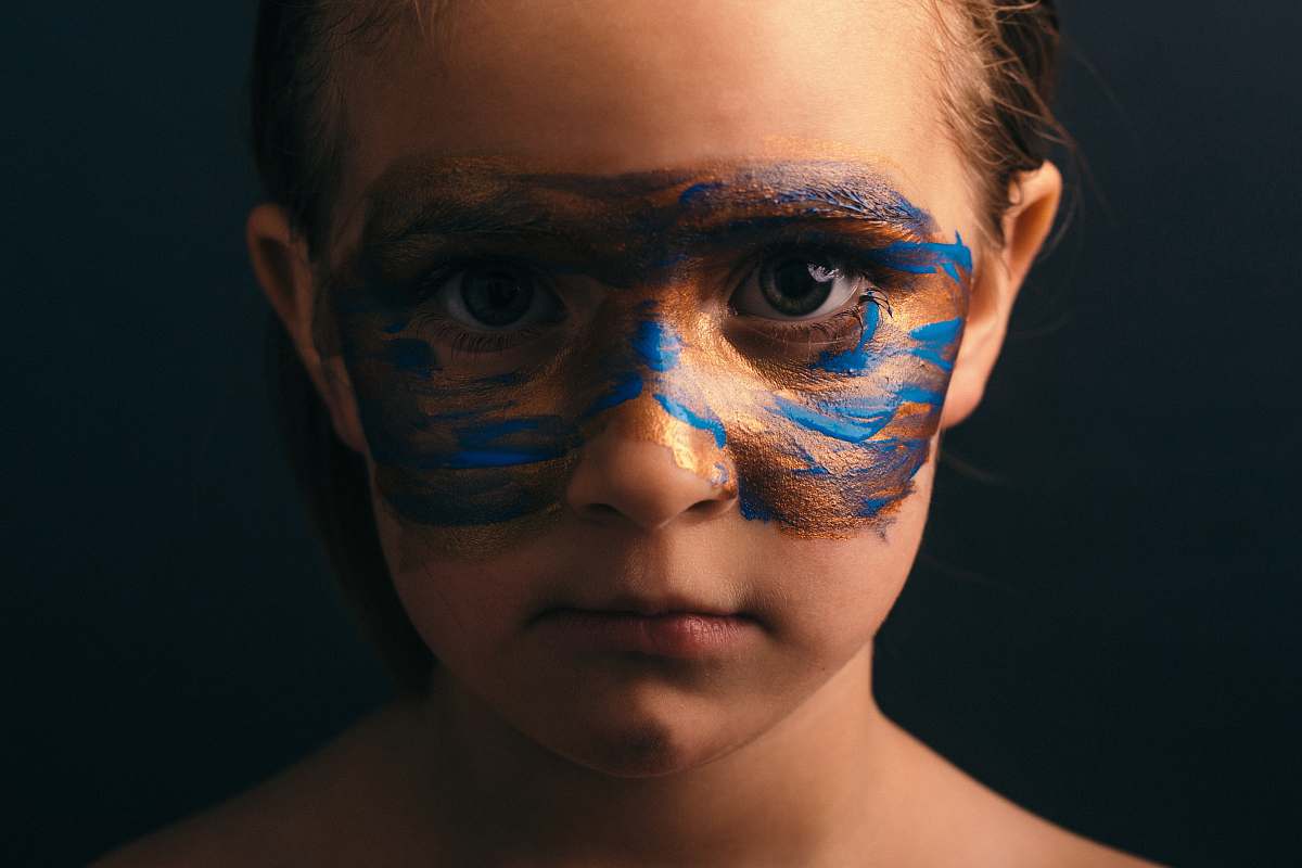 people close up photo of girls with face paint human