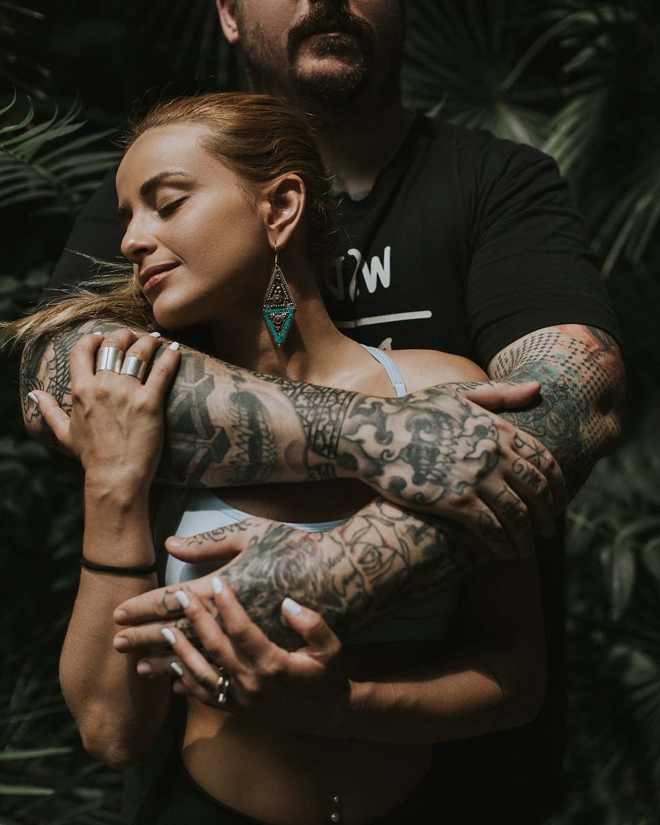 people man hugging a woman human