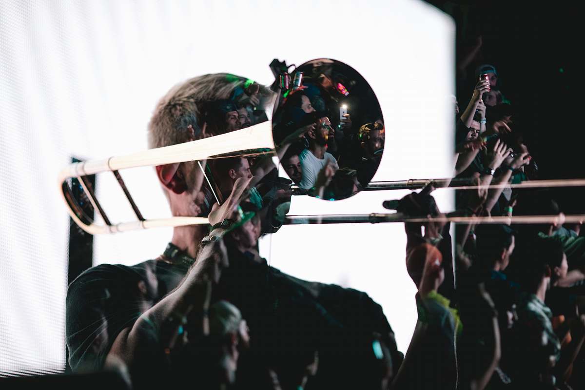 people man playing trombone with white screen background human