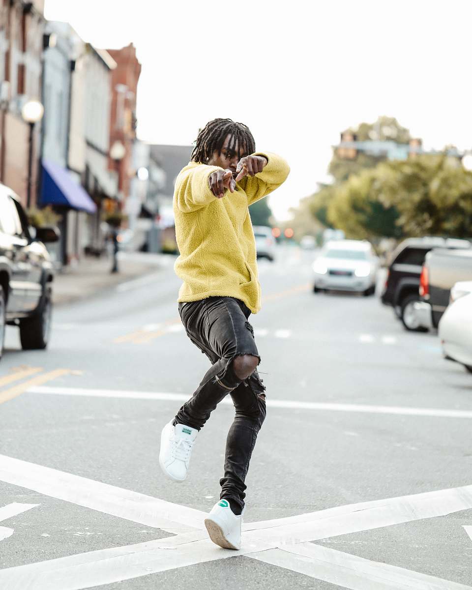people man standing on street at daytime human