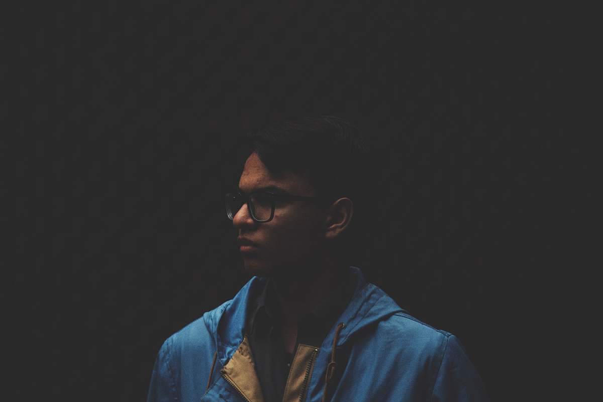 people selective focus photo of man with dark background human