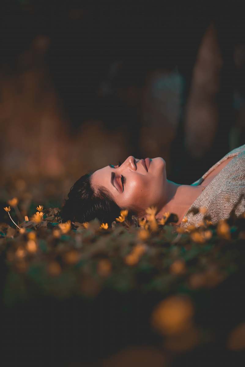 people woman lying on grass human